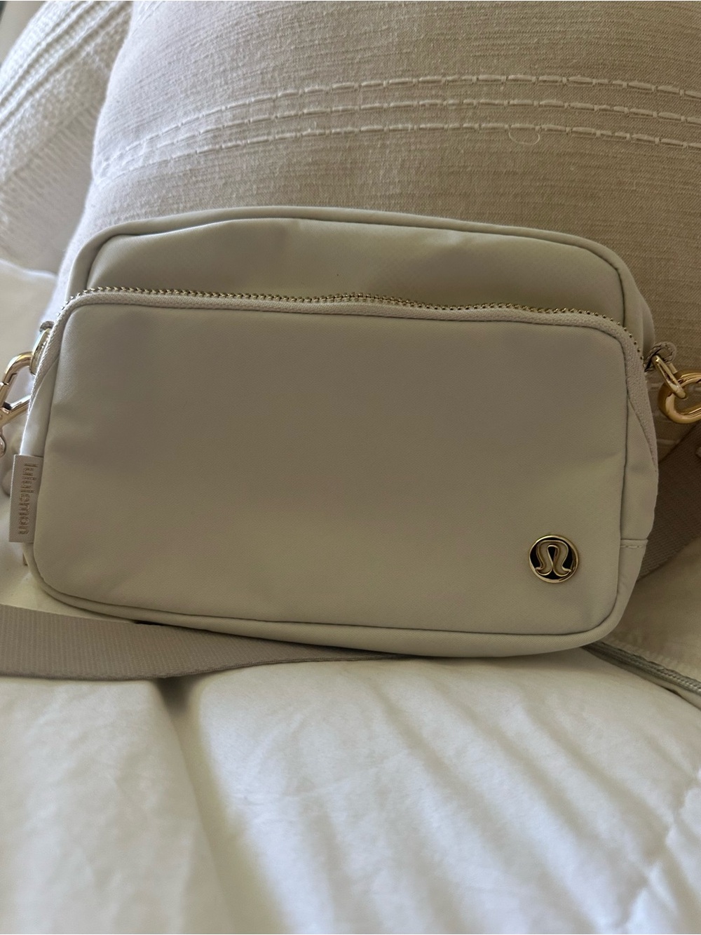 lululemon athletica Cream Crossbody Pouch with Gold Hardware
